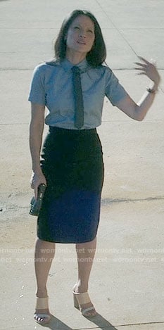 Joan’s blue short sleeved shirt and tie on Elementary