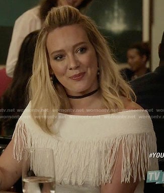 Kelsey’s white fringed off-shoulder top on Younger