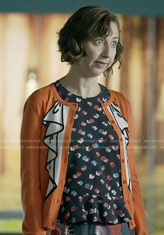 Carol’s floral top and orange ruffle print cardigan on Last Man on Earth
