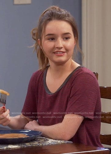 Eve’s red striped tee with cutout back on Last Man Standing