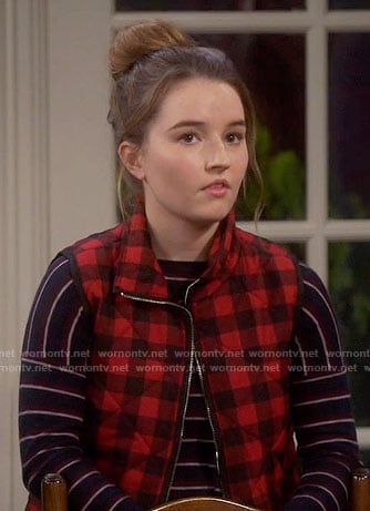 Eve’s striped sweater and red checked vest on Last Man Standing