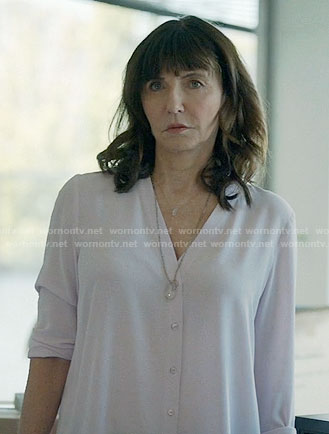 Gail’s white v-neck button front blouse on Last Man on Earth
