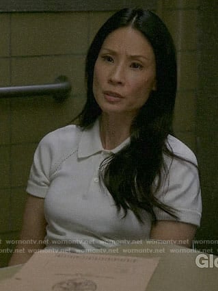 Joan’s white knit polo top on Elementary