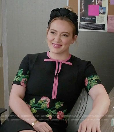 Kelsey’s black floral embroidered dress with pink bow on Younger