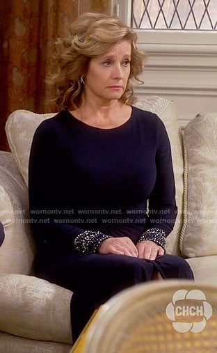 Vanessa’s navy mother of the bride dress with embellished cuffs on Last Man Standing