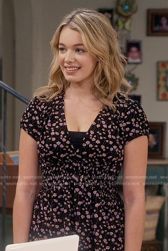 Violet’s black and purple floral dress on Mom