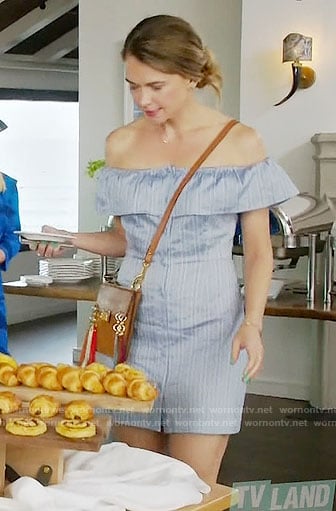 Liza’s blue striped off-shoulder dress and tassel bag on Younger