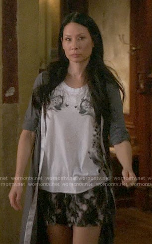 Joan’s mirrored cheetah graphic top on Elementary