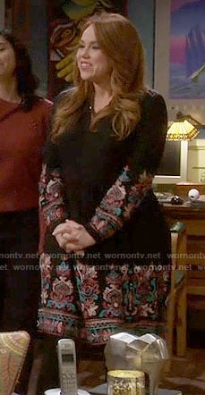 Kristin’s black embroidered long sleeve dress on Last Man Standing