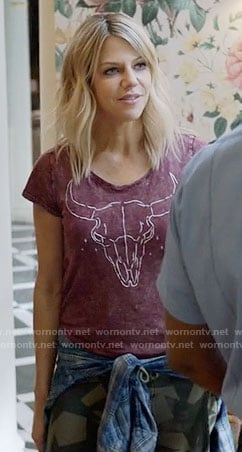 Mickey’s red skull graphic tee and star print sweatpants on The Mick