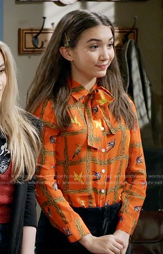 Riley’s orange bird print blouse on Girl Meets World