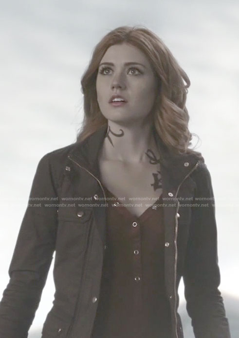 Clary’s red henley top and brown field jacket on Shadowhunters