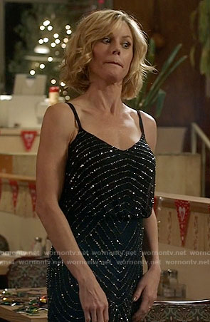 Claire’s navy beaded gown on Modern Family