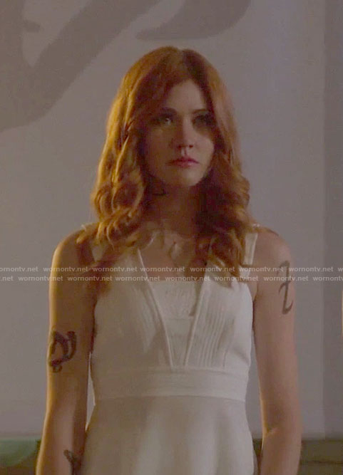 Clary’s white peplum top with back slit on Shadowhunters