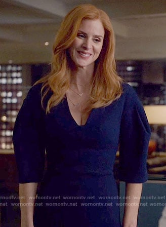 Donna’s navy blue dress with flared sleeves on Suits
