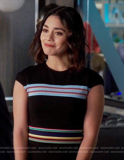Emily’s black midi dress with multi colored stripes on Powerless