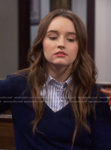 Eve’s blue striped ruffle trim shirt on Last Man Standing