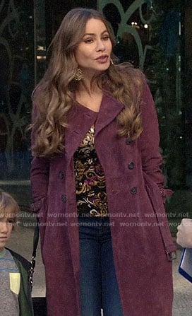Gloria’s purple suede trench coat on Modern Family