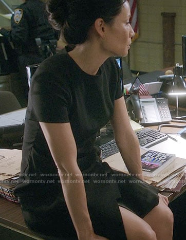 Joan’s black short sleeved wrap dress on Elementary