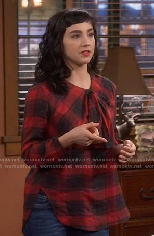 Mandy’s red plaid top with bow on Last Man Standing