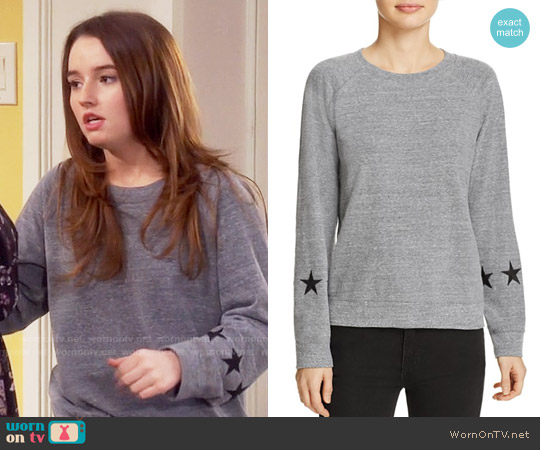 Monrow Star Sleeve Sweatshirt worn by Eve Baxter (Kaitlyn Dever) on Last Man Standing
