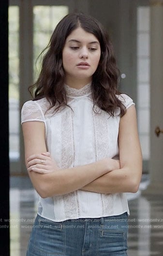 Sabrina’s white lace cap-sleeve top on The Mick