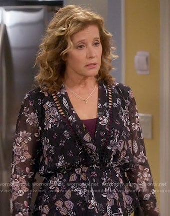 Vanessa’s black leaf print blouse on Last Man Standing