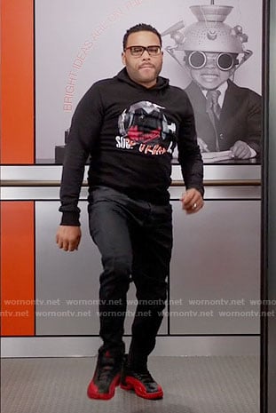 Andre’s black graphic hoodie and black and red sneakers on Black-ish