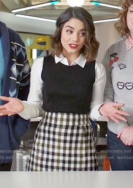Emily’s checked skirt on Powerless