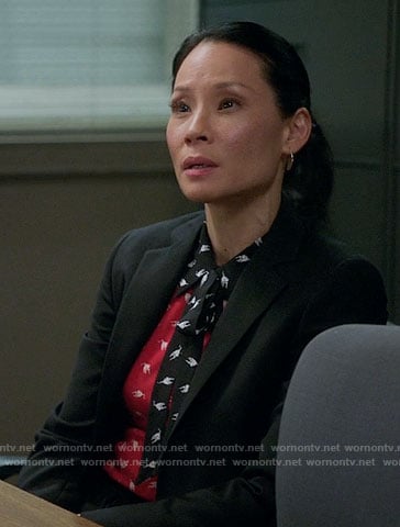 Joan’s red and black bird print top on Elementary