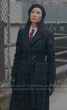 Joan’s long checked coat on Elementary