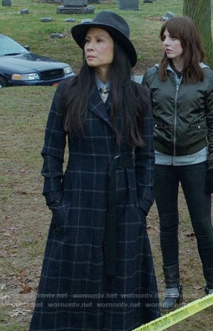 Joan’s long checked coat on Elementary