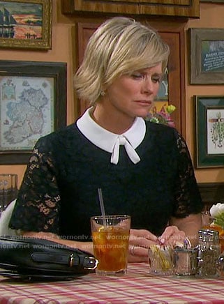 Kayla’s navy lace dress with white collar and tie on Days of our Lives