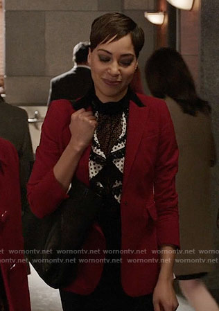 Lucca’s ruffled lace-trim top and red colorblock blazer on The Good Fight