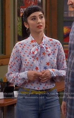 Mandy’s blue and red star print blouse on Last Man Standing