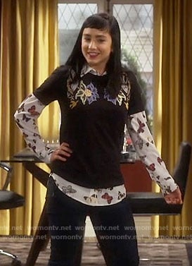 Mandy’s butterfly print shirt and floral top on Last Man Standing
