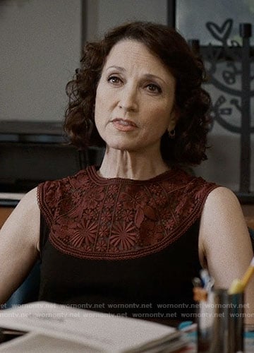 Nadine’s black dress with burgundy lace panel on Madam Secretary