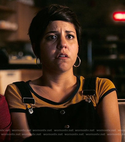 Annie’s yellow top and black overalls on Girlboss