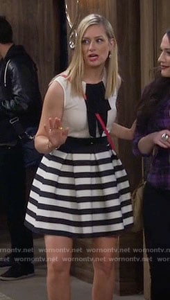 Caroline’s white top with black bow and striped skirt on 2 Broke Girls