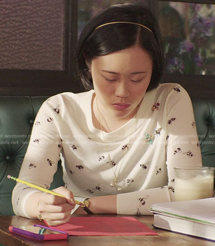 Courtney’s bee print sweater on 13 Reasons Why