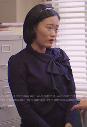 Courtney’s black bow jacket on 13 Reasons Why