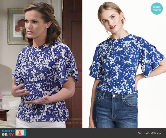 H&M Blouse with Trumpet Sleeves in Dark Blue / Floral worn by Chelsea Lawson (Melissa Claire Egan) on The Young and the Restless