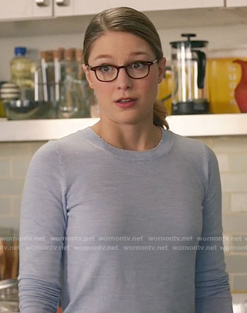 Kara’s blue sweater with scalloped neckline on Supergirl