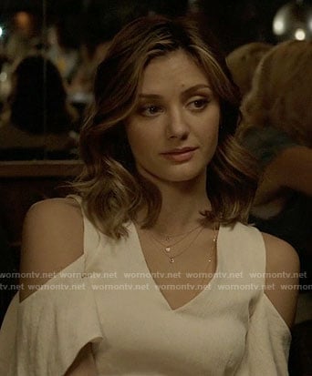 Megan’s white cold-shoulder jumpsuit on The Arrangement