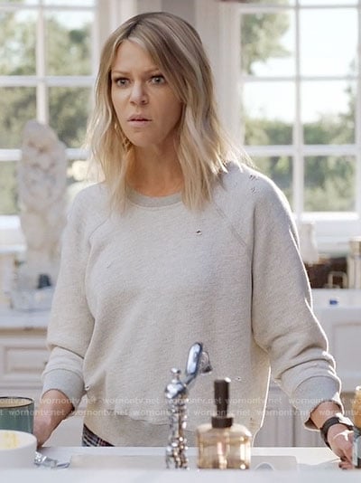 Mickey’s distressed sweatshirt on The Mick