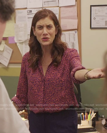 Olivia’s pink printed blouse on 13 Reasons Why