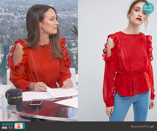 ASOS Ruffle Cold Shoulder Blouse with Pintuck Front and Lace Insert worn by Catt Sadler on E! News