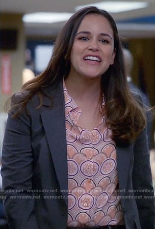 Amy’s orange print shirt on Brooklyn Nine-Nine