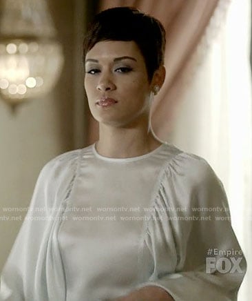Anika’s white flared sleeve top on Empire