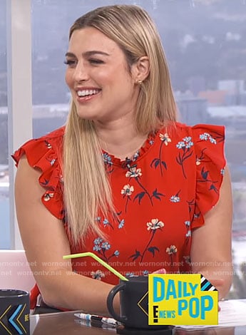 Carissa’s red floral ruffle-trim top on E! News Daily Pop